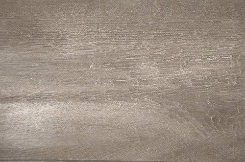 Brush applying Eco Wood Treatment onto a wood surface.