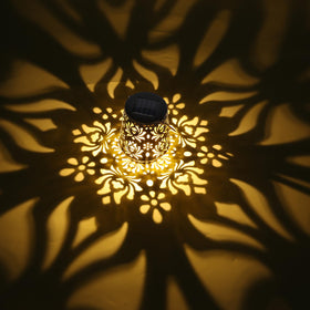 Edenseelake bronze lanterns illuminating a garden path at night