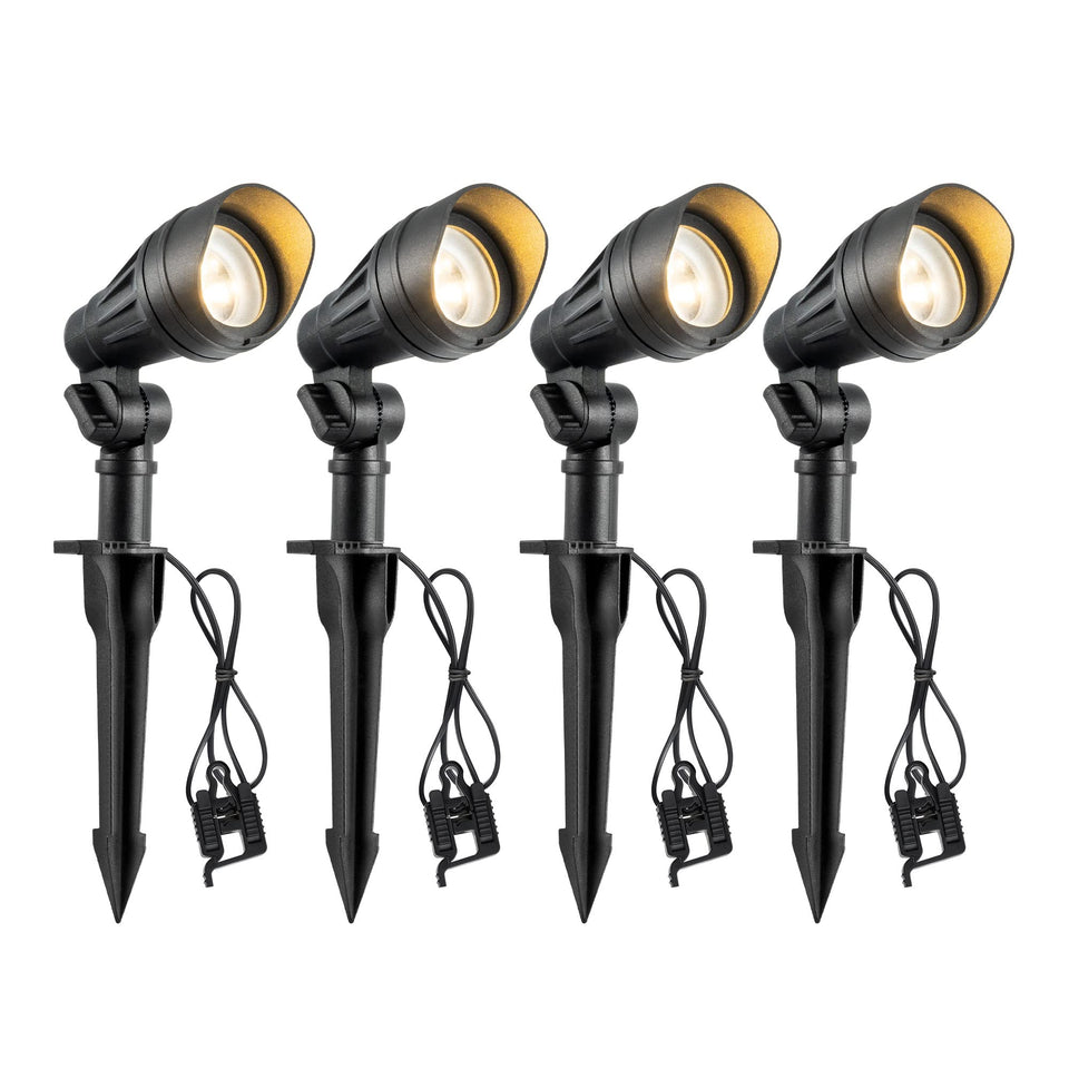 EDISHINE low-voltage landscape light along a garden path with warm 3000K glow for safe navigation
