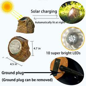 EiGreen solar rock light charging in sun to illuminate paths.
