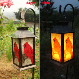 EiGreen night ambience with red bird adds color to porch or gazebo