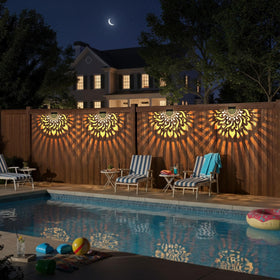 EKQ solar fence lights provide backyard warm glow for evenings