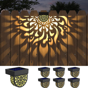 EKQ solar fence lights decorate the front yard with warm glow