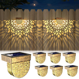 EKQ solar fence lights pack illuminate pathways with warm yellow glow for welcoming exteriors.