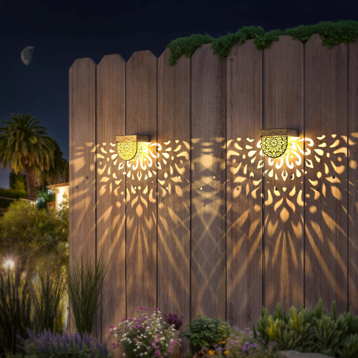 EKQ solar wall lights warm yellow create ambience along fences and garden walls.