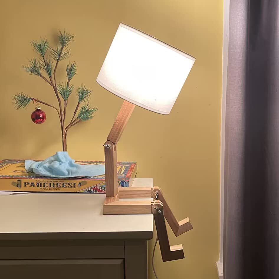 ELINKUME modern bedside lamp adds contemporary style to living rooms.