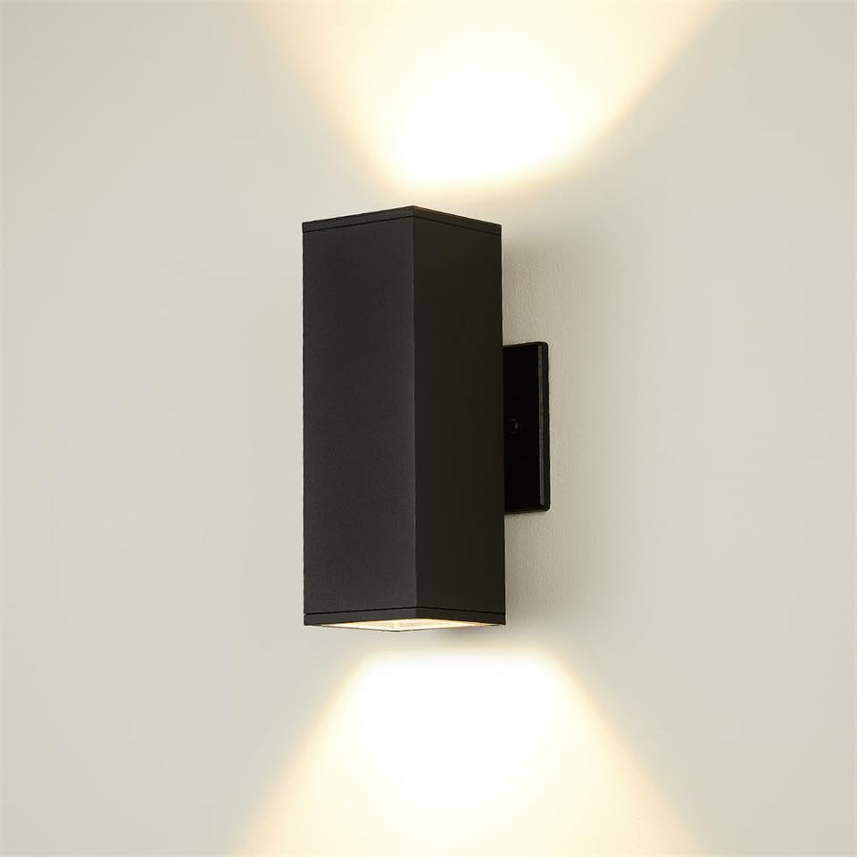 Eliphil outdoor wall light with up-down glow in matte black finish for ambient exterior illumination.