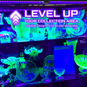 Elwoks 365nm UV bar in a cabinet highlights minerals with vivid fluorescence.