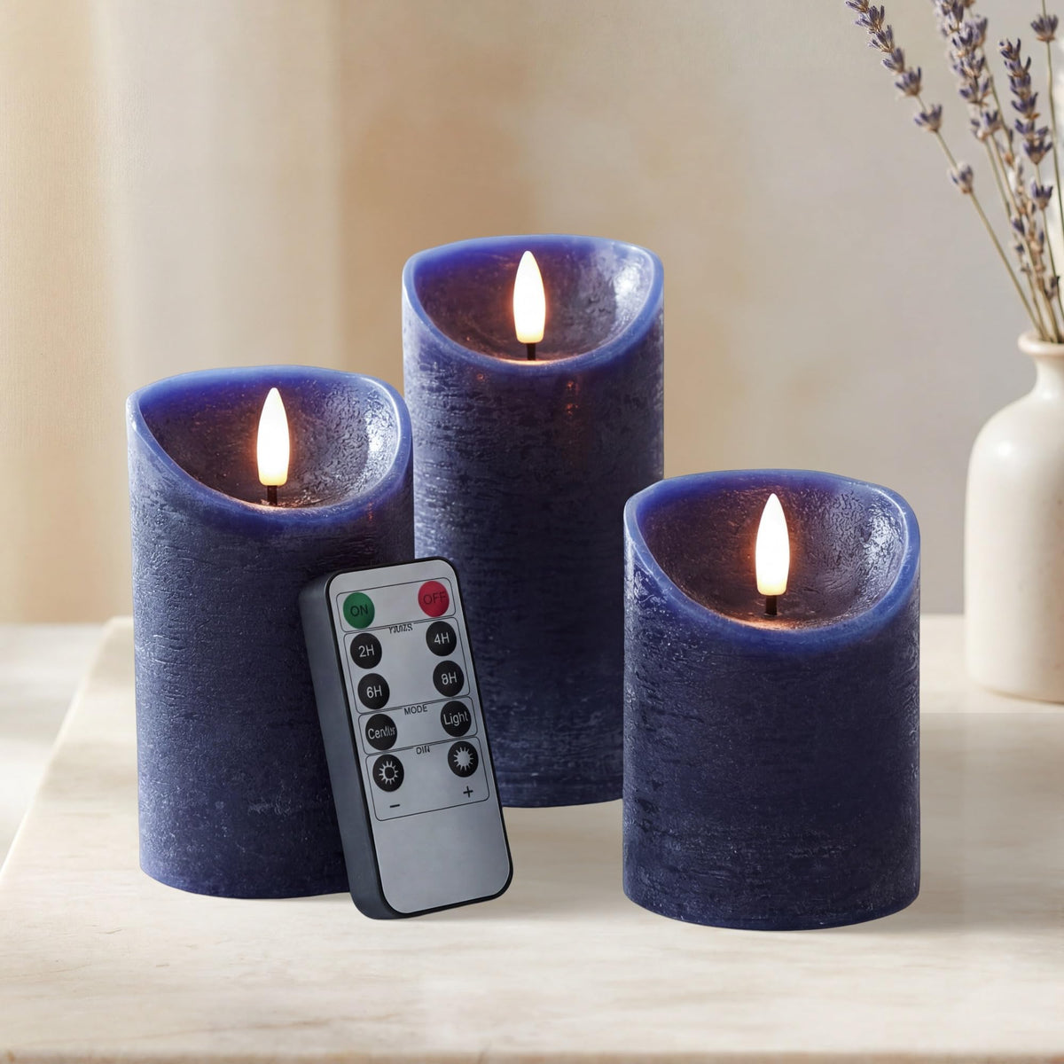 Elyrae navy blue pillar candle 3x4 inch with realistic wax texture for authentic look.