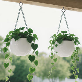 Emiluil wind chimes on a patio secured by eye hooks