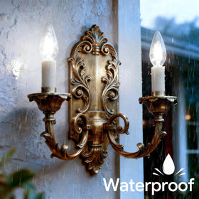 Energetic Lighting outdoor bulbs installed in a garage fixture for durable exterior lighting.