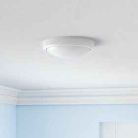 Energizer battery-operated LED tap light mounted under cabinet for quick pantry illumination.