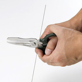 ENGINEER cutting cotton insulated cables smoothly