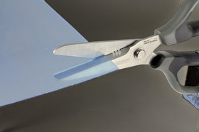 ENGINEER PH-57 cutting coaxial cable and rope to demonstrate durability.