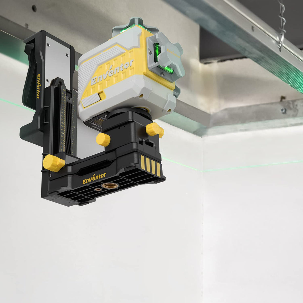 Magnet-enabled base attaching securely to metal surfaces during ceiling or wall setups.