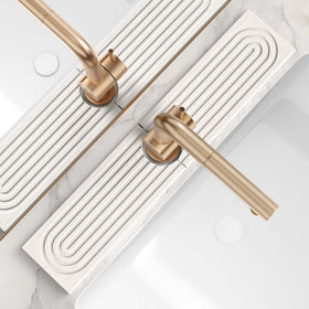 Eormoe stone faucet mat absorbs spills quickly at the sink.