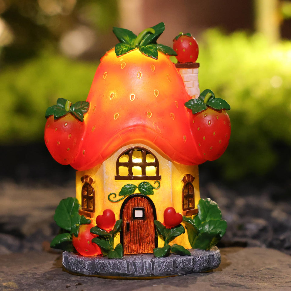 EPTUEGA solar fairy garden house strawberry front glows softly for cozy outdoor charm.
