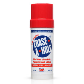 Erase-A-Hole quick-dry nail hole filler in action on drywall for seamless repairs.