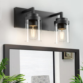 Espird vanity light with clear glass shade brightens mirrors and enhances a modern farmhouse look.