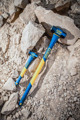 Estwing 36-inch fiberglass handle visible for optimal arc swing and leverage.