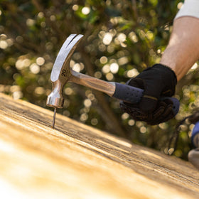 Estwing E3-20S being used for nail driving in a workshop