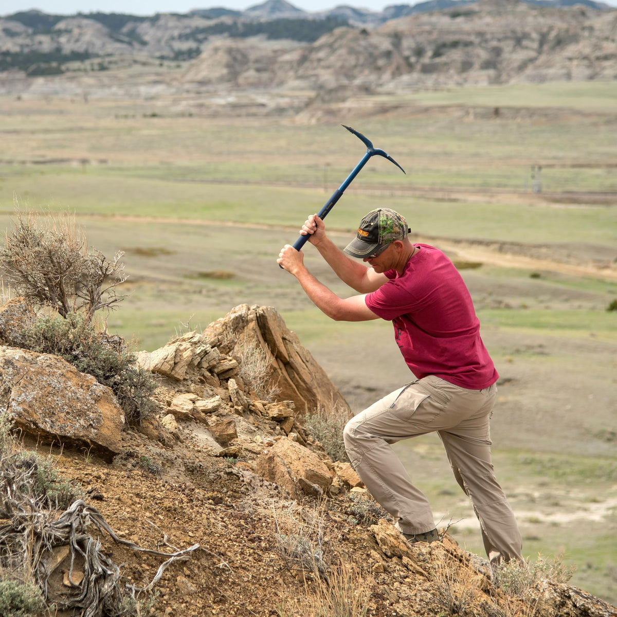 Estwing Geo/Paleo Rock Pick with no-slip cushion grip for secure handling in adverse conditions.
