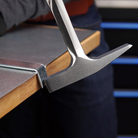 Estwing Tinner's Hammer one-piece forged steel construction emphasizes durability.