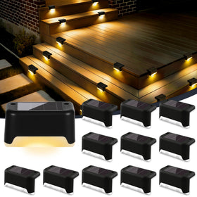 ESUNYD solar deck light emits warm white glow at dusk for safe outdoor steps