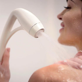 ETL BodySpa white packaging contents including plumber's tape and hose
