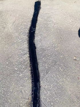 EWT crack and joint repair tape bonding permanently on pavement