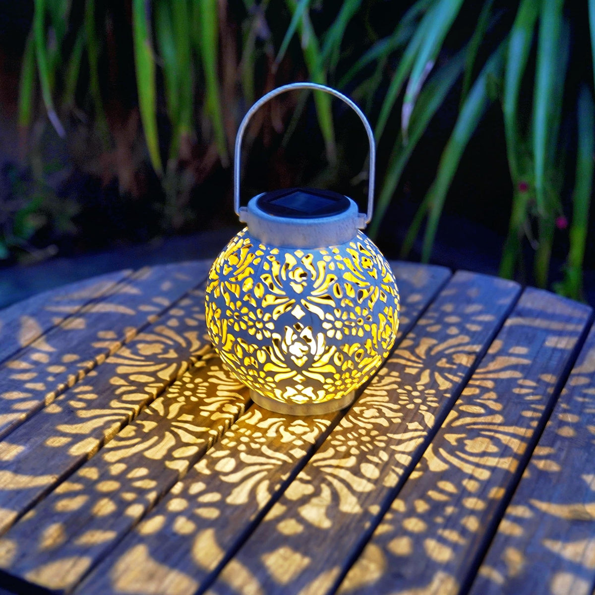 EXCMARK metal lantern with rustic finish adds yard charm