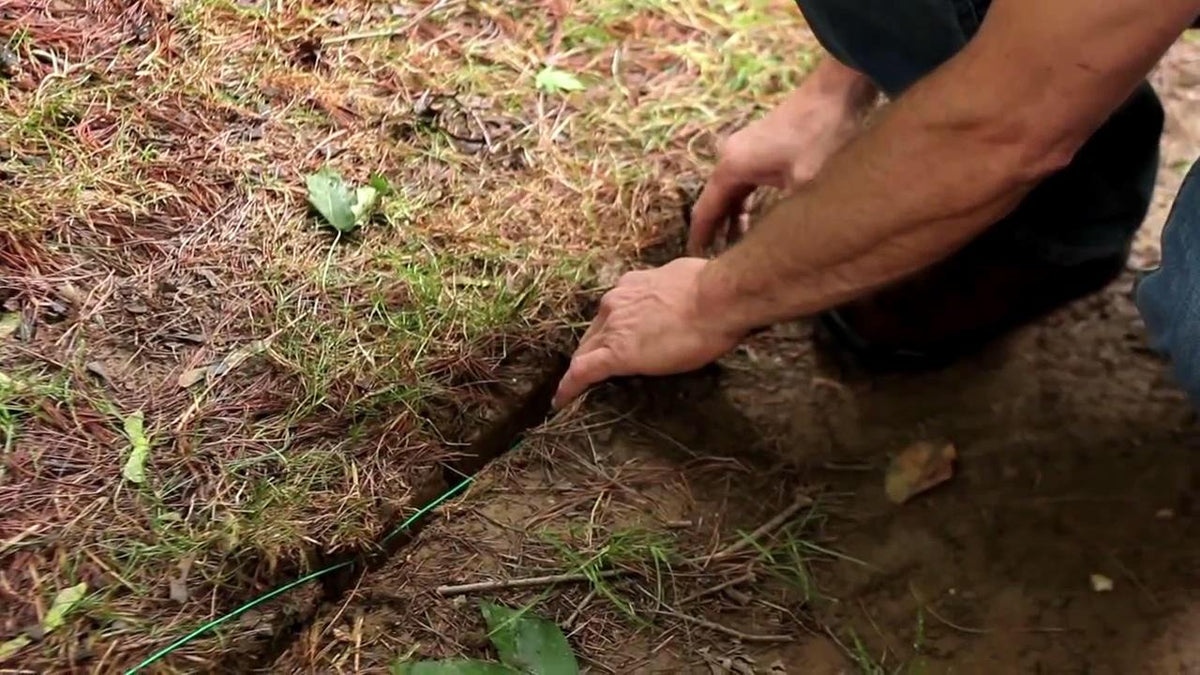 Extreme Dog Fence staples secure above-ground sections for quick installs.