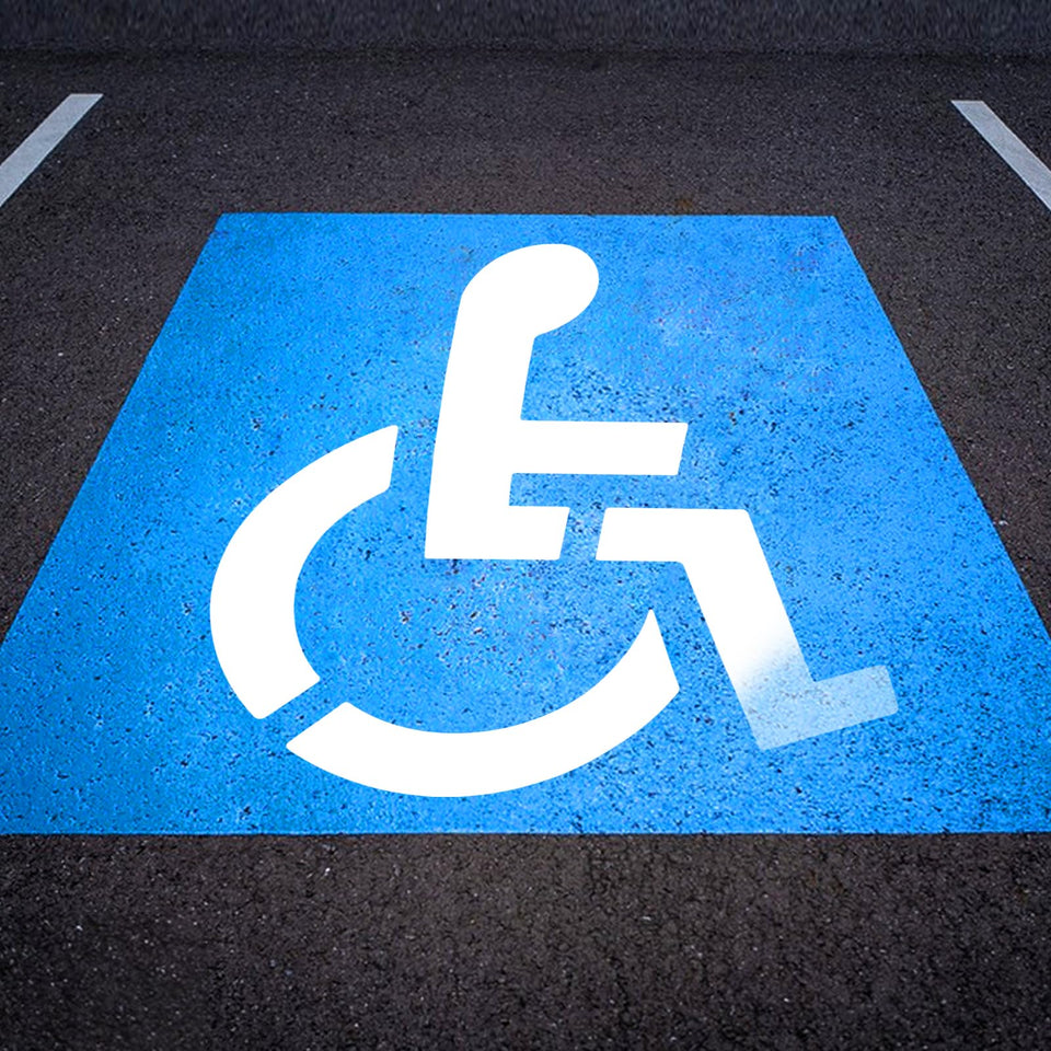 EYUNSTAR handicap parking stencil 36x36 laid on asphalt for precise, reusable markings.