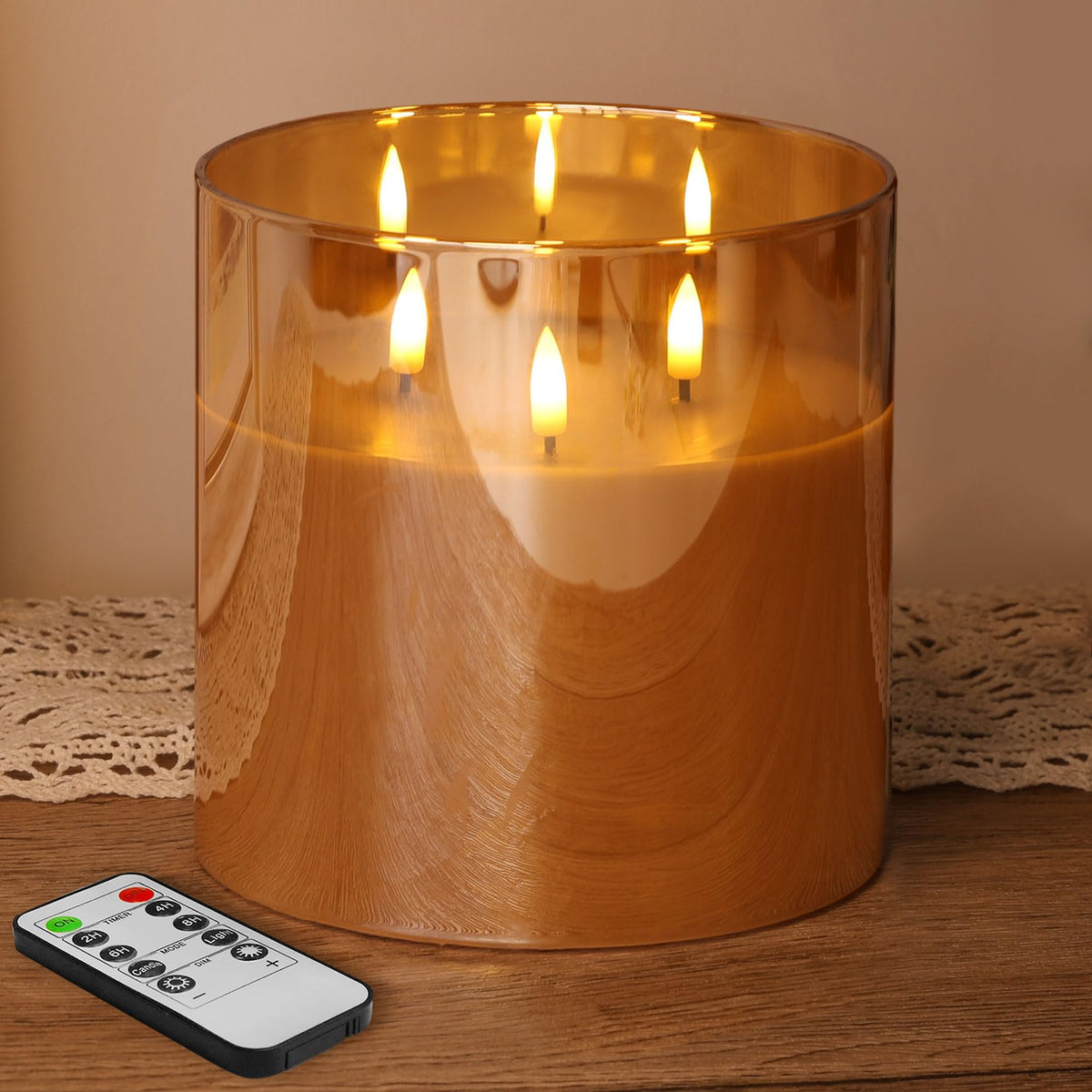 Eywamage 3-wick gold glass candle glows warmly for living room ambience.