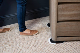 EZ Moves Large Slide on carpet facilitates safer repositioning of sofas and tables.