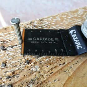 EZARC carbide oscillating blade in action cutting hardened metal