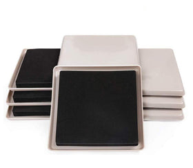 Ezprotekt 8-pack 5-inch sliders under furniture on beige carpet for easy moves.
