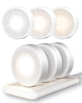 EZVALO LED puck light with charging station illuminates cabinets and charges simultaneously.