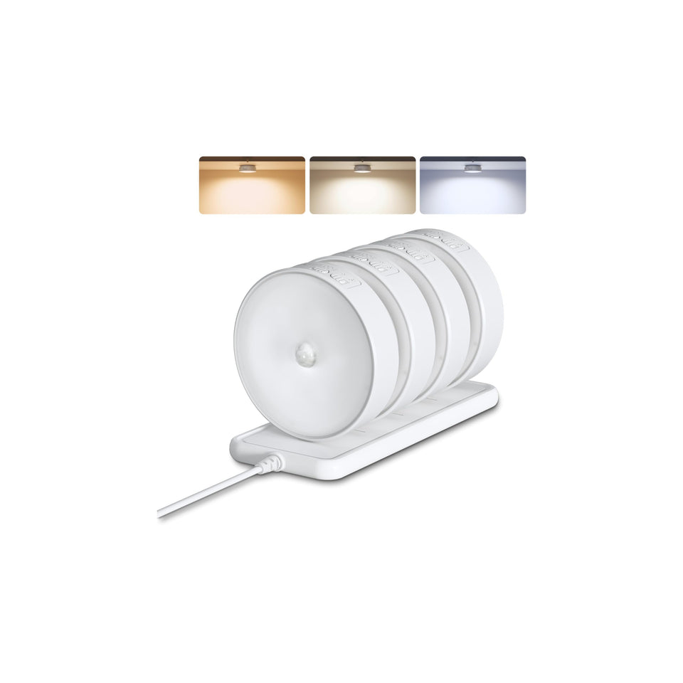 EZVALO puck light front view illuminates a cabinet with gentle brightness