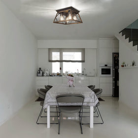 FadimiKoo ceiling light above dining table invites conversation with gentle glow.