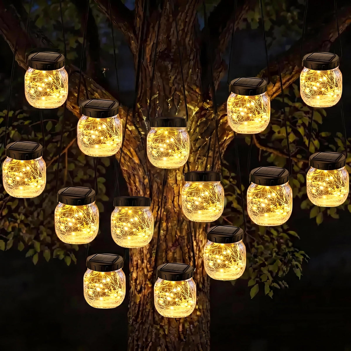 Fairdeer solar lanterns glowing at dusk with warm crackle-glass ambiance.
