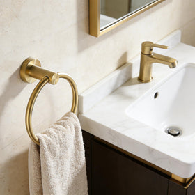 Brushed gold finish on FAIRGIA hardware adds durable luxury for daily use.