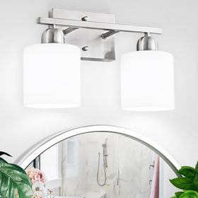 FAISHILAN brushed nickel two-light vanity fixture brightens the mirror area.