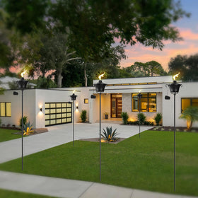 6-pack FALBAWR citronella torches brighten outdoor events with warm glow.
