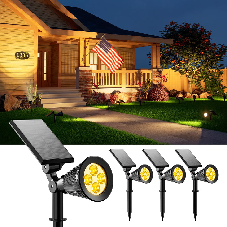 FALOVE 4-pack solar spotlights brighten garden path with a warm, welcoming glow.