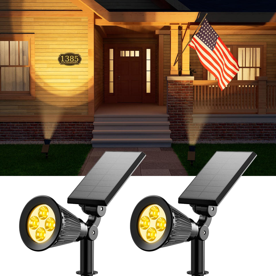 FALOVE solar spotlight 2-pack lights up the patio with warm white glow.