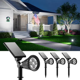 Falove solar spotlight focused on a tree to create dramatic garden accents.