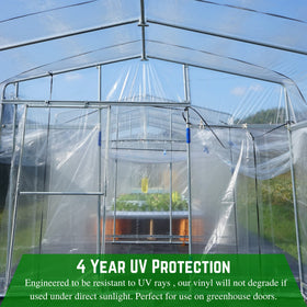 Farm Plastic Supply clear vinyl sheeting shields greenhouse doors while maintaining light.