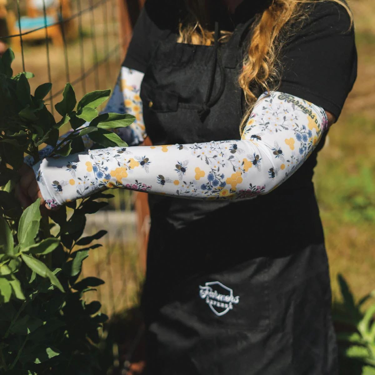 FARMER'S DEFENSE breathable fabric keeps arms cool during outdoor tasks.