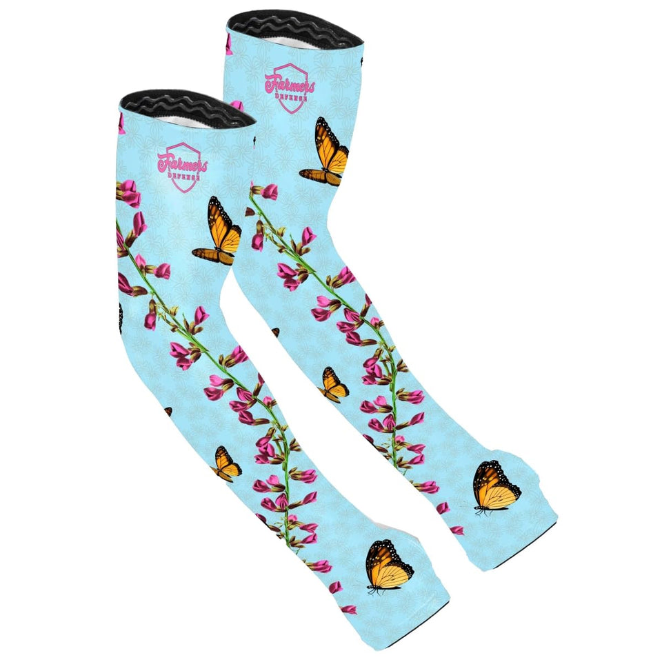 FARMER'S DEFENSE Monarch arm sleeves protect skin with UPF 50+ and cooling for gardening.